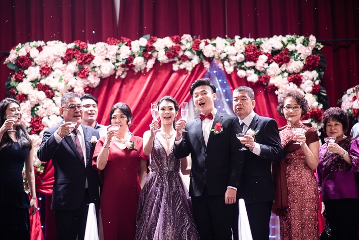 Champagne toasting or Yum Seng